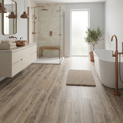 Cartmel Oak Luxury Click Vinyl Flooring 5mm installed in a contemporary bathroom, featuring warm oak wood-effect SPC planks with authentic natural grain, realistic knot detailing and a matt finish, creating a waterproof, durable and stylish space ideal for modern homes.