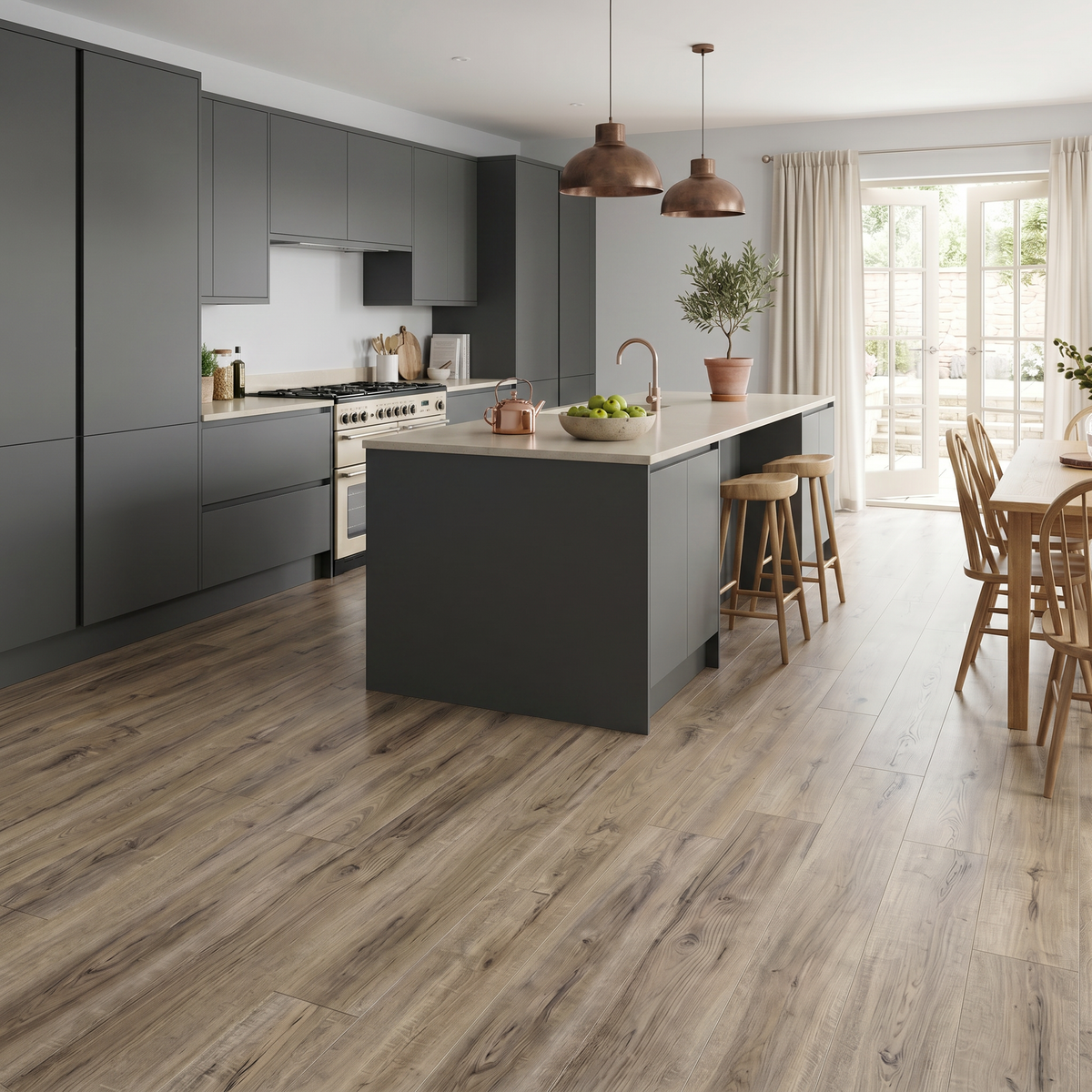 Cartmel Oak Luxury Click Vinyl Flooring 5mm installed in a contemporary open-plan kitchen, showcasing warm oak wood-effect SPC planks with authentic natural grain, subtle knot detailing and a realistic matt finish, creating a stylish, durable and waterproof family living space.