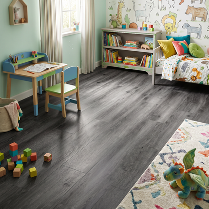 Honister Slate Grey Luxury Click Vinyl Flooring 5mm installed in a modern children's bedroom, showcasing dark slate grey wood-effect SPC planks with authentic grain, realistic knot detailing and a durable matt finish, ideal for waterproof family homes, nurseries and playrooms.