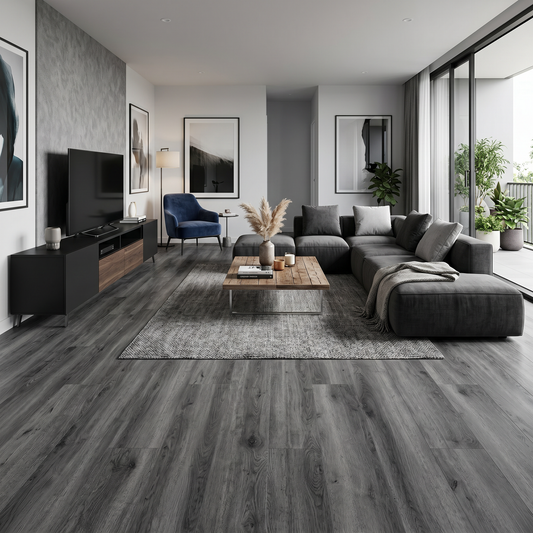 Honister Slate Grey Luxury Click Vinyl Flooring 5mm installed in a contemporary living room, showcasing dark slate grey wood-effect SPC planks with authentic grain, realistic knot detailing and a durable matt finish, ideal for modern waterproof flooring throughout the home.