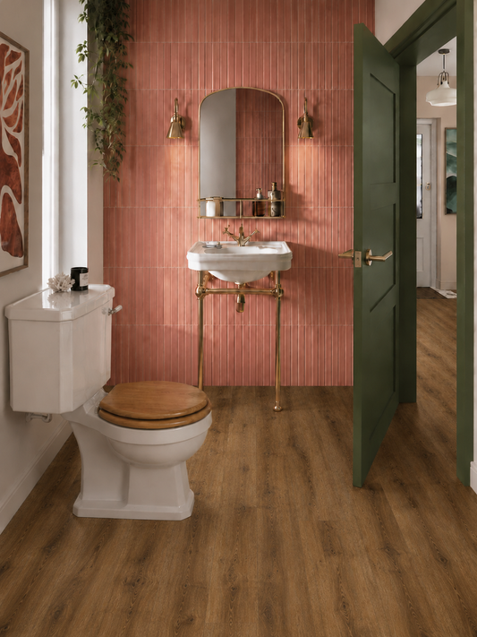 Sugar Oak SPC luxury vinyl flooring installed in a modern bathroom, featuring realistic oak-effect planks, waterproof performance and authentic wood grain detail. Ideal flooring for bathrooms, en-suites, cloakrooms and family homes.