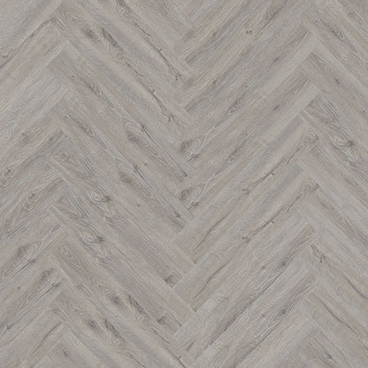 Gran Canaria Herringbone Luxury Click Vinyl Flooring 5mm close-up featuring elegant mid-grey wood-effect SPC herringbone planks with authentic natural grain, realistic knot detailing, subtle texture and a matt finish, creating a timeless, contemporary flooring design.