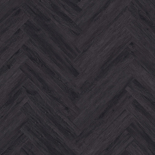 Close-up of Black Ash Herringbone Luxury Click Vinyl Flooring 5mm, showcasing a classic herringbone pattern with deep charcoal black ash tones, authentic wood grain detailing and a realistic embossed matt finish for a bold contemporary wood-effect floor.