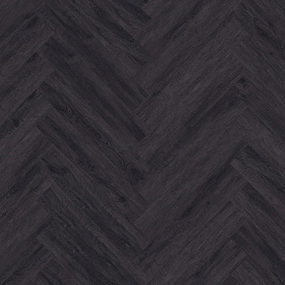 Close-up of Black Ash Herringbone Luxury Click Vinyl Flooring 5mm, showcasing a classic herringbone pattern with deep charcoal black ash tones, authentic wood grain detailing and a realistic embossed matt finish for a bold contemporary wood-effect floor.